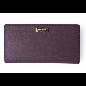 Purple Kate Spade wallet. In great condition